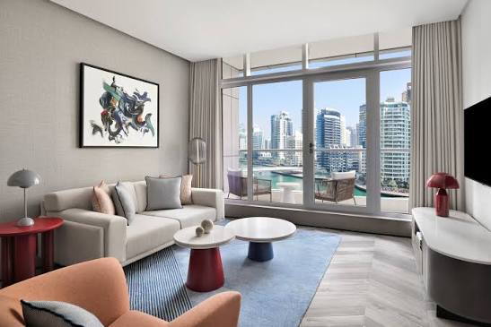 Furnished one-bedroom apartment living room with a Dubai Marina view